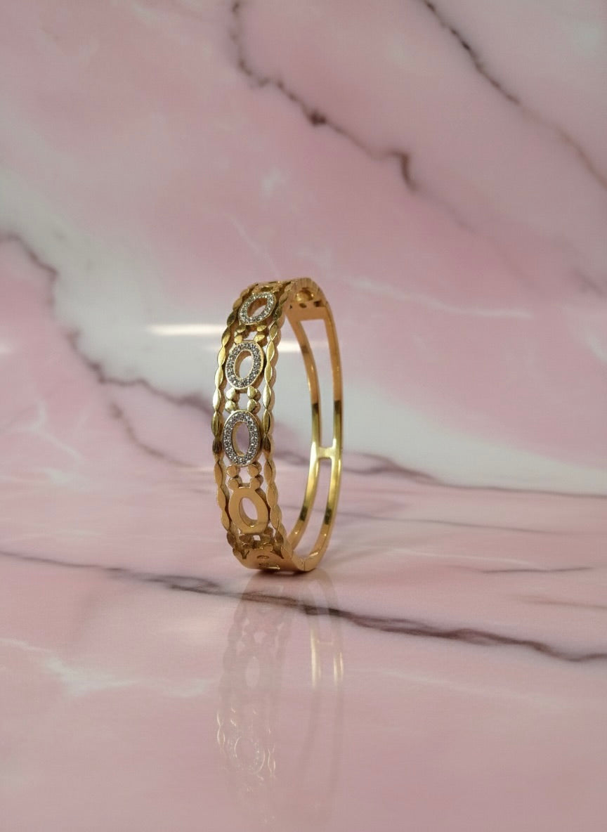 Gold Geometric Oval Crystal Bangle – Designer Style | Tarnish-Free | Premium Finish